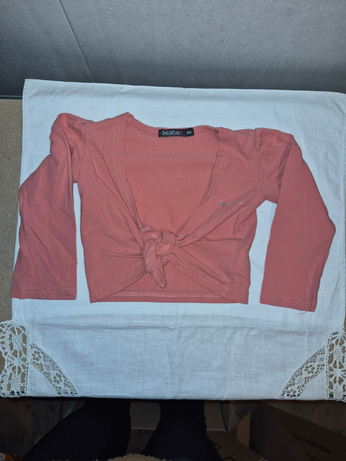 Vestje roze met knoop maat 86